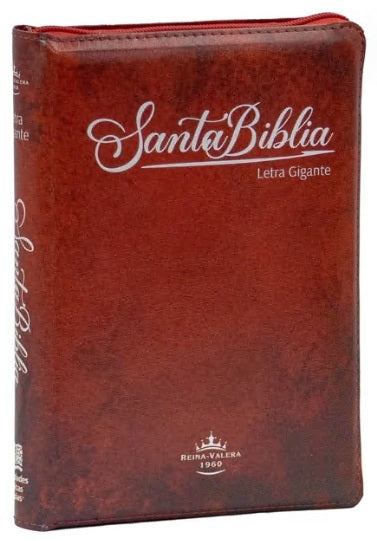 Biblia Reina Valera 1960 de imitación de cuero marrón con cremallera, titulada Santa Biblia en letras blancas y con las Palabras de Jesús en Rojo.