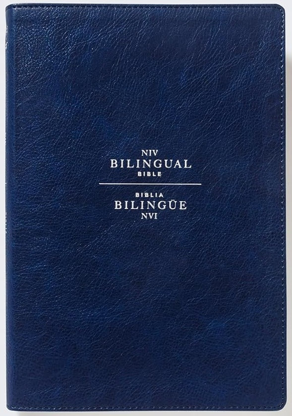 Un libro de tapa dura de color azul marino titulado «NIV Bilingual Bible / Biblia Bilingüe NVI», con texto blanco en la portada, que incluye la Nueva Versión Internacional (NVI) y la New International Version en un formato «Comfort Print» de lectura clara.