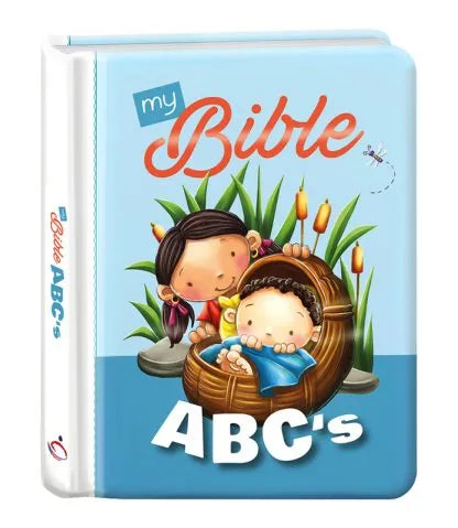 Portada de un libro infantil de cartón con el abecedario, titulado «My Bible ABC’s», en la que aparecen niños ilustrados, uno de ellos en una cesta entre juncos, en referencia a la historia del pequeño Moisés de la Biblia.