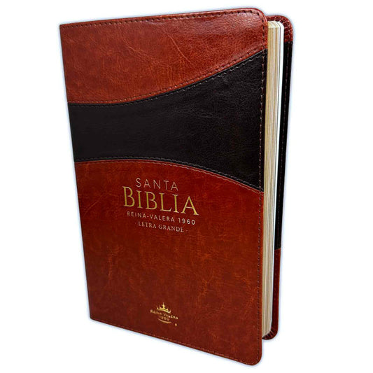 Una Biblia en español con una cubierta de imitación de piel en tonos marrón y negro, titulada «Santa Biblia Reina-Valera 1960 Letra Grande» en letras doradas.