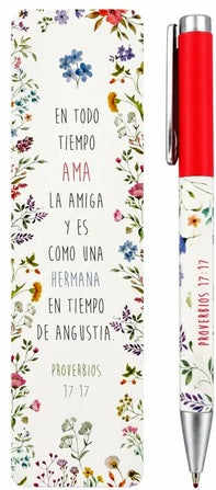 Un marcapáginas con motivos florales y un bolígrafo a juego, ambos con una inscripción del versículo bíblico de Proverbios 17:17 sobre una amiga fiel.