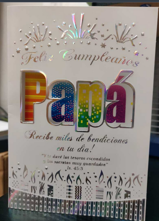 Tarjeta cristiana para papá con el mensaje «Feliz cumpleaños, papá» en letras de colores, fuegos artificiales y un versículo bíblico (Isaías 45:3) con bendiciones en español.