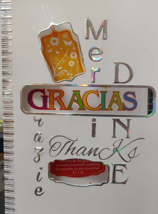 Una tarjeta cristiana con la palabra «GRACIAS» en letras de colores, rodeada de «Merci», «Thanks» y «Grazie» en tipografías metalizadas, y Efesios 1:16 como pequeña referencia bíblica en la parte inferior. Perfecta para compartir bendiciones.