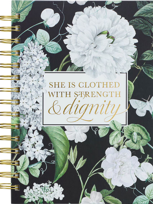 Un cuaderno con encuadernación de espiral y motivos florales, con la frase «She is clothed with strength & dignity» impresa en dorado en la portada, con páginas rayadas para tomar notas fácilmente.