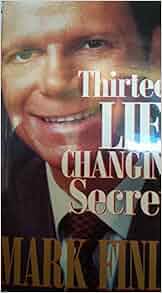 Portada del libro en la que aparece un primer plano del rostro de un hombre, con el título «Thirteen Life Changing Secrets» parcialmente visible y el nombre del autor, Mark Fini, en la parte inferior.