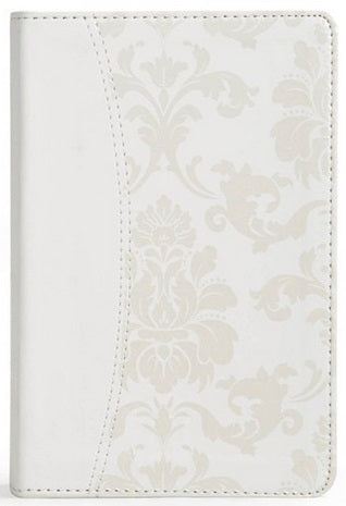 Un diario o cuaderno blanco con tapa dura, ideal como «Biblia de la novia» o recuerdo de boda, presenta un sutil estampado floral en tonos beige y un detalle de costura curvada en la cubierta.