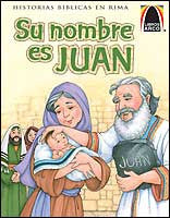 Portada de un libro infantil español titulado *Su nombre es JUAN*, de la colección Libros Arco, en la que aparece una mujer con un bebé en brazos, un hombre mayor con una tableta en la que se lee «JUAN» y, al fondo, varias personas compartiendo *historias bíblicas*.