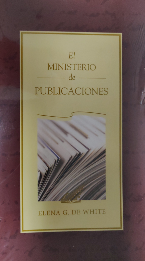 Portada del libro titulado *El Ministerio de Publicaciones*, de Elena G. de White, en la que aparece una imagen de las páginas de un libro abiertas.