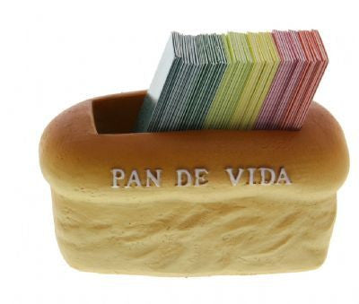 Un recipiente de plástico con forma de pan y la etiqueta «PAN DE VIDA» contiene una pila de tarjetas multicolores con versículos bíblicos de Christian Art Gifts, perfectas para compartir inspiración diaria o como bendición de alimentos en tu mesa.
