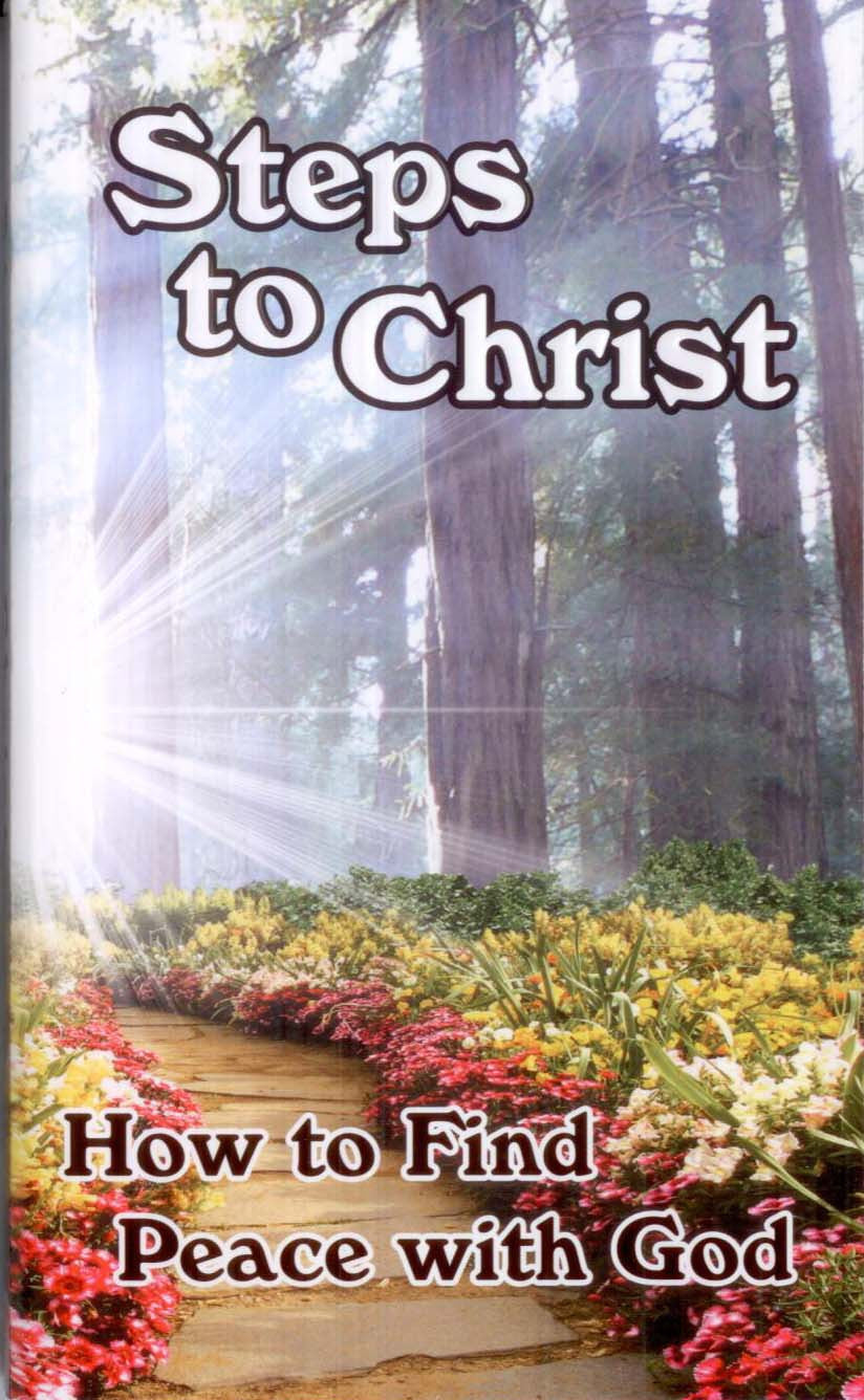 Portada del inspirador libro «Pasos hacia Cristo», subtitulado «Cómo encontrar la paz con Dios», en la que se ve un sendero en el bosque bordeado de flores y con la luz del sol filtrándose entre los árboles: una preciosa edición cristiana en rústica.