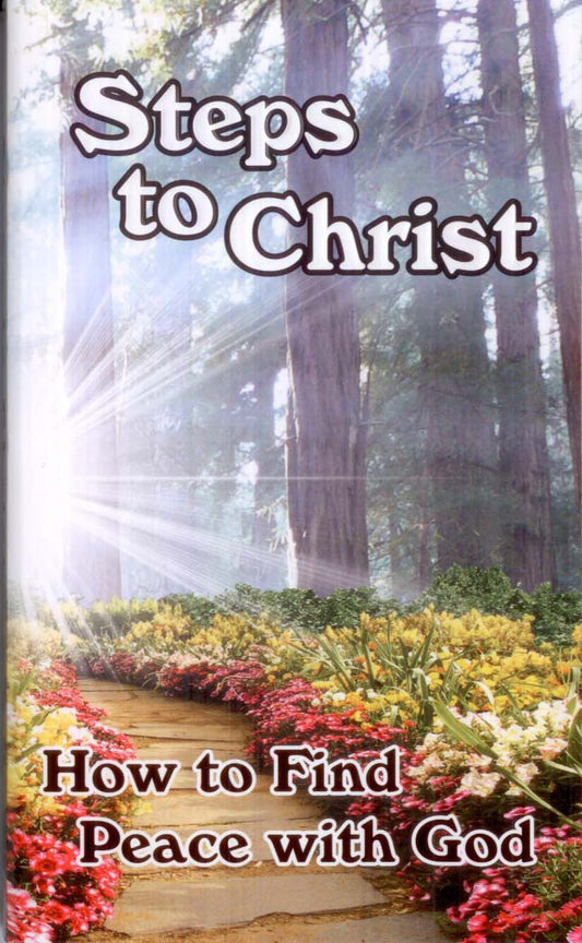 Portada del inspirador libro «Pasos hacia Cristo», subtitulado «Cómo encontrar la paz con Dios», en la que se ve un sendero en el bosque bordeado de flores y con la luz del sol filtrándose entre los árboles: una preciosa edición cristiana en rústica.