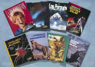 Hay ocho libros de tapa dura de National Geographic para niños dispuestos sobre una superficie, con temas como misterios, animales, el sistema solar, la selva tropical y fenómenos naturales en sus portadas, ilustradas con colores vivos.