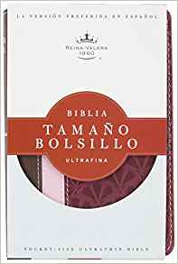 Portada de una Biblia ultradelgada en formato de bolsillo en español, edición Reina-Valera 1960, con un diseño en tonos rosa y burdeos que se aprecia a través del embalaje, ideal para la lectura diaria y para descubrir el plan de salvación.